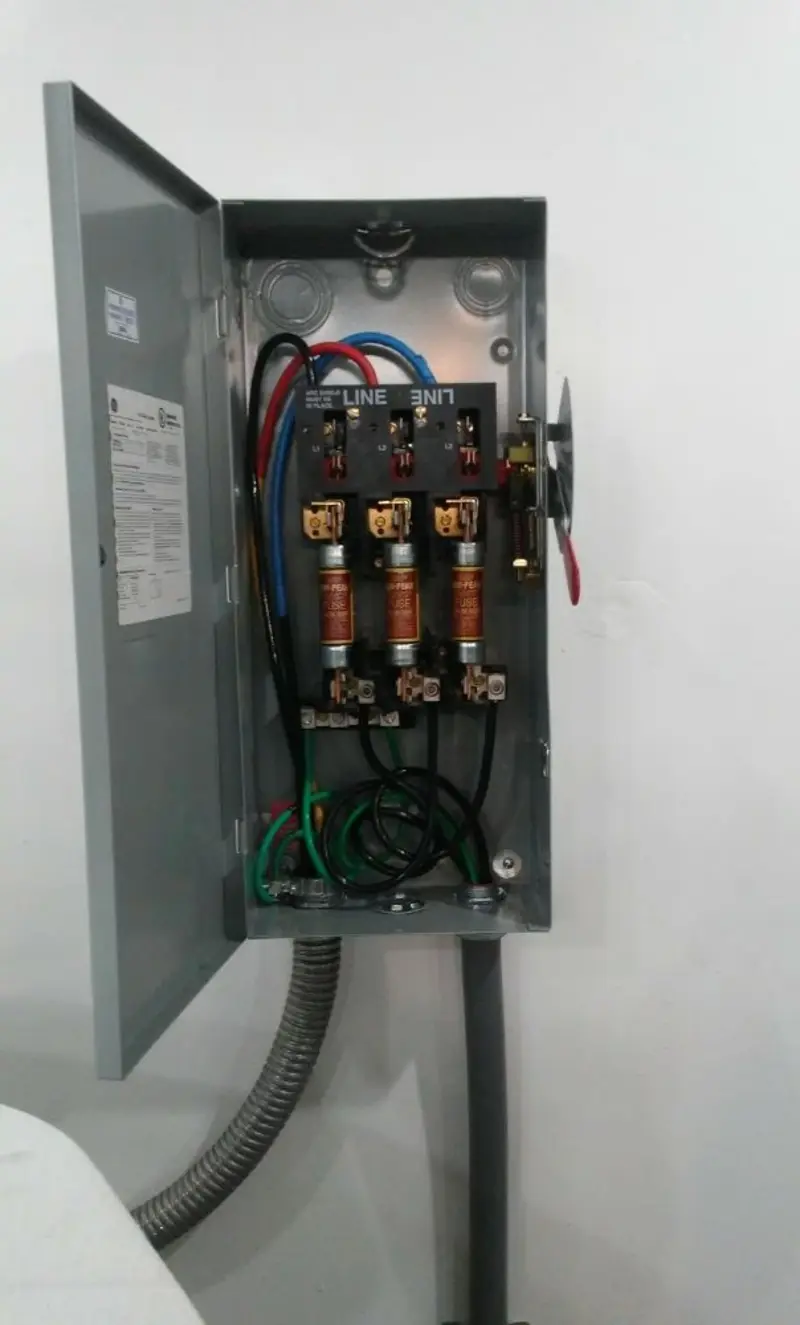 Three-phase disconnect switch installed for Smoke Detector Installation in Central City